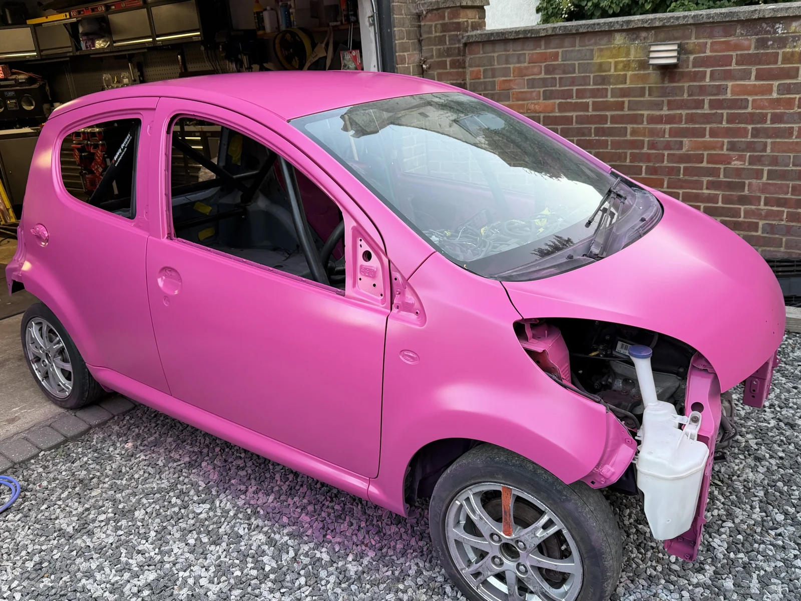 The C1 freshly painted pink, before its lights and livery were fitted